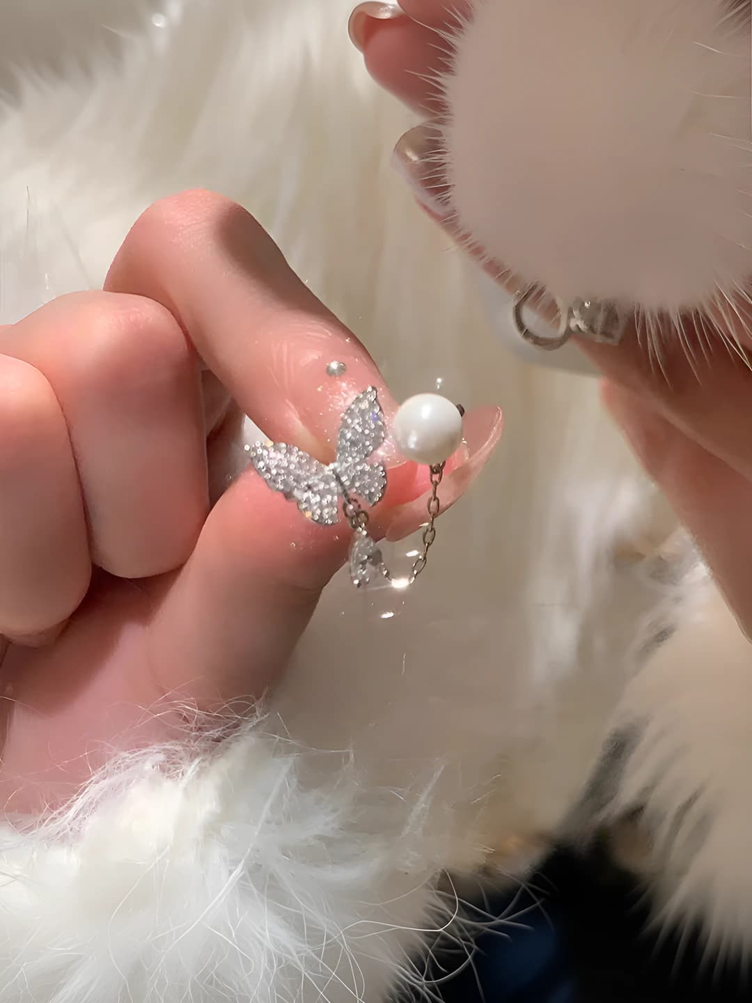 Women's ring with crystals, pearls and butterfly design