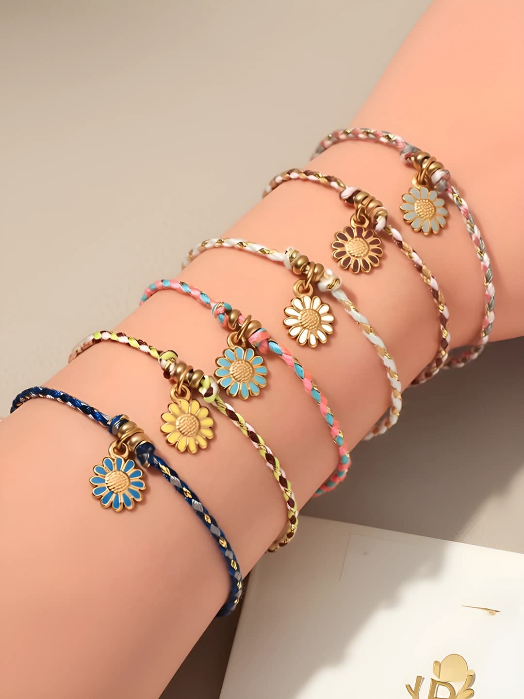 Women's hand-woven colorful cord bracelet with stainless steel sunflower pendant in OL style