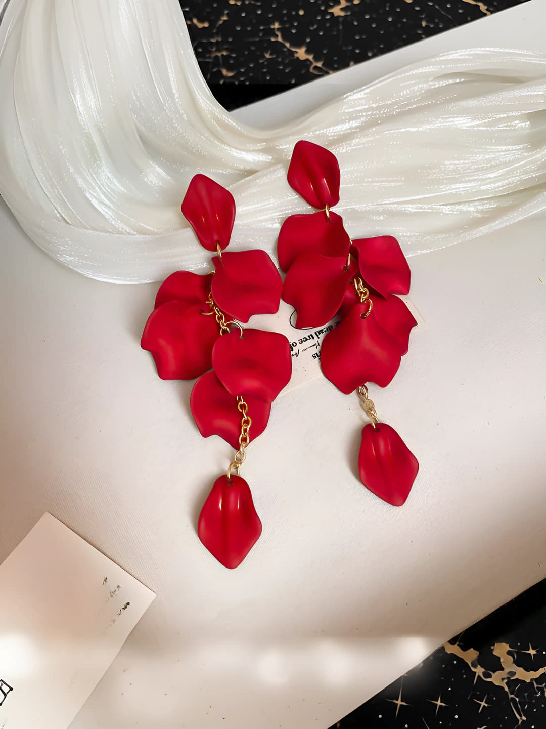 189# Silver - Red tassel