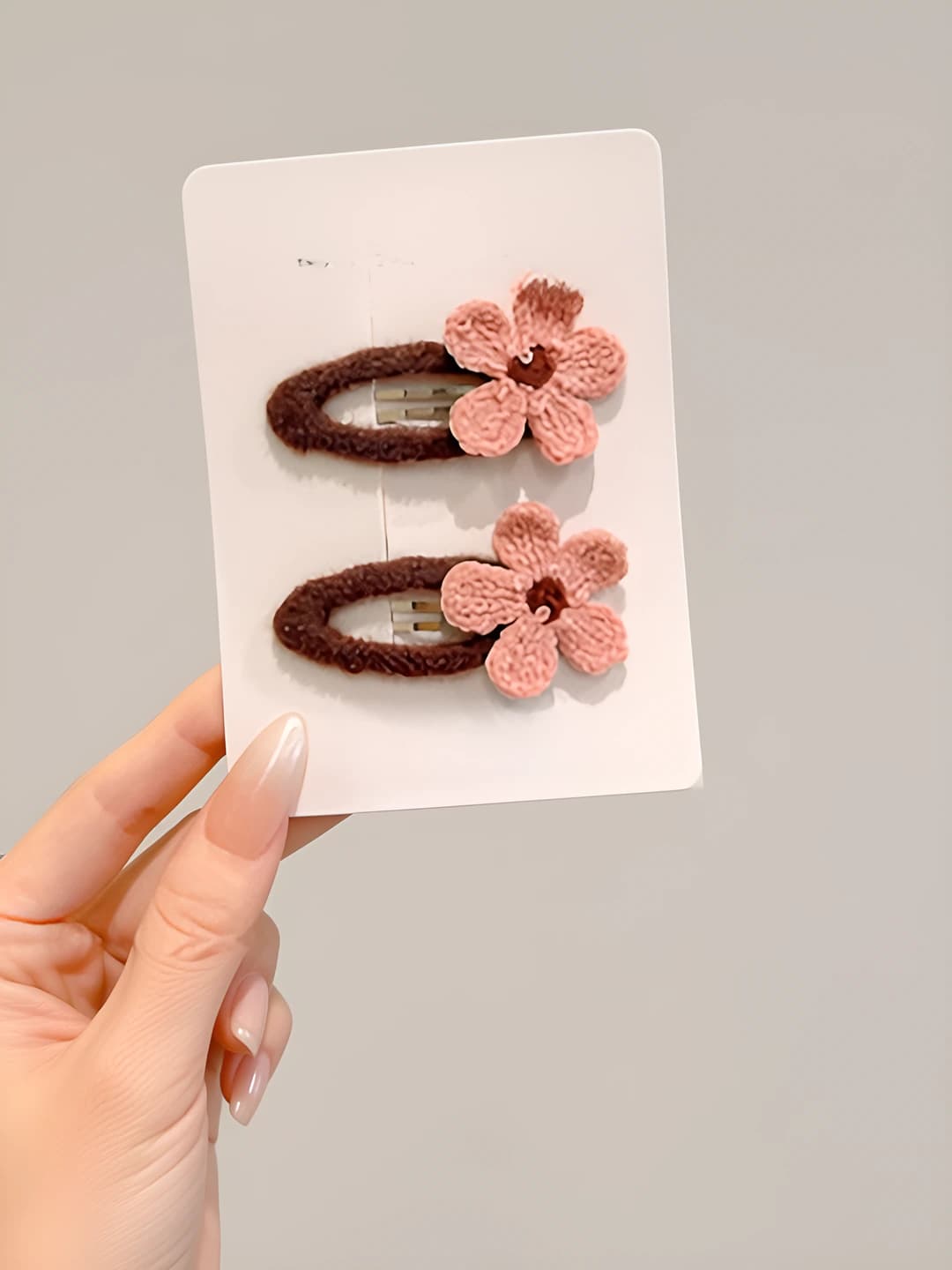 Pink knitted floral clip, ~6 cm