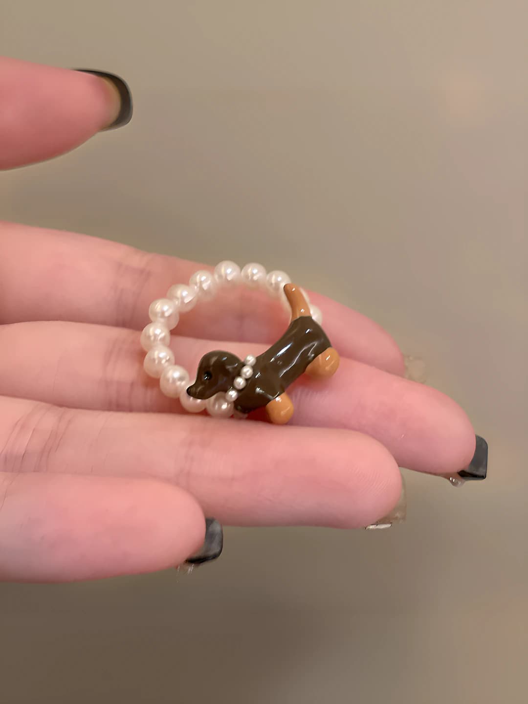 Pearl puppy ring