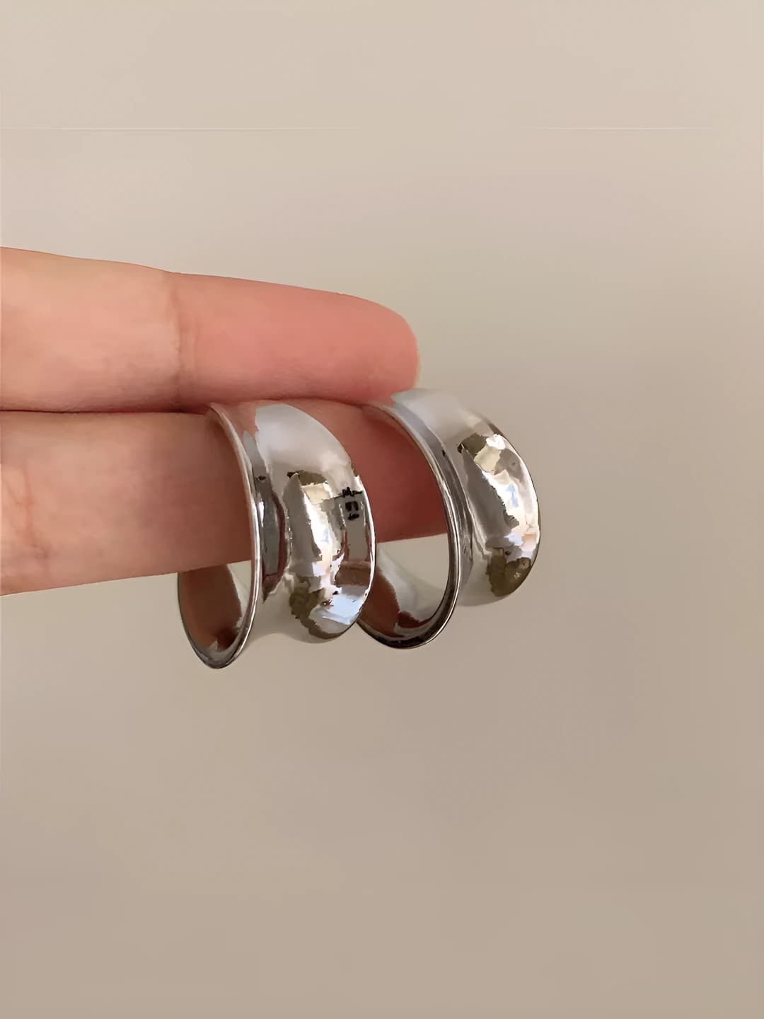 Silver geometric C-shape earrings
