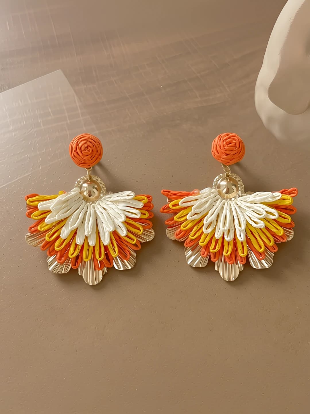 Orange fan-shaped studs