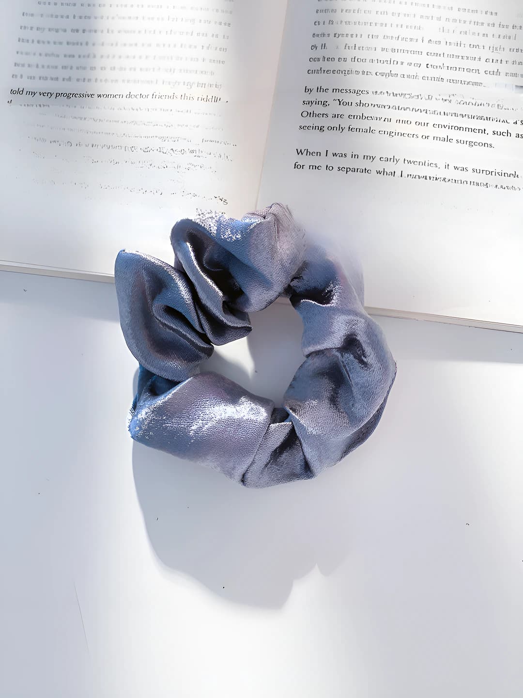 Glossy, silver-grey