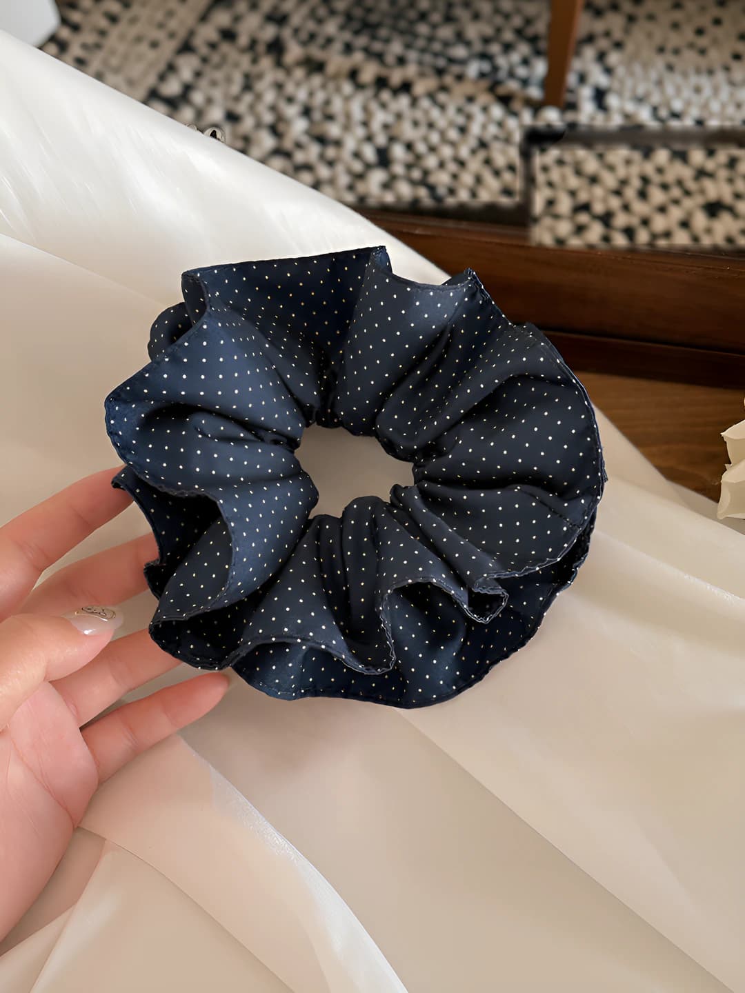 Large, polka dot hair tie
