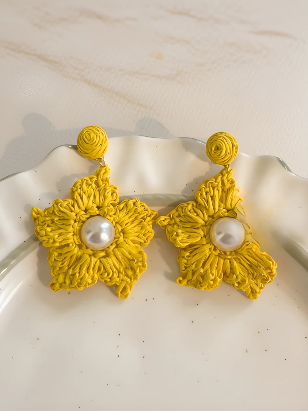 Yellow woven pearl star studs, 925