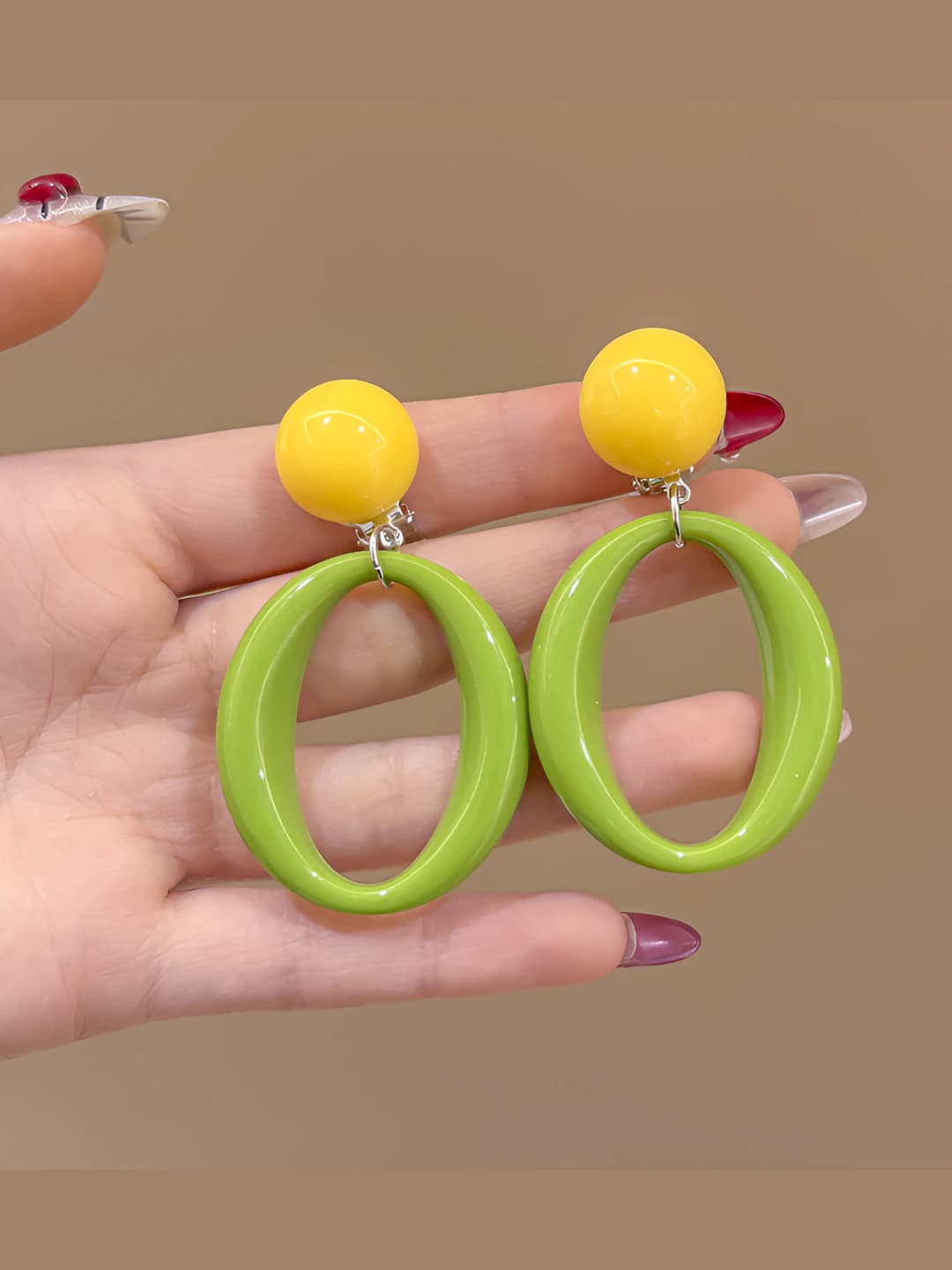 Yellow-green oval earrings