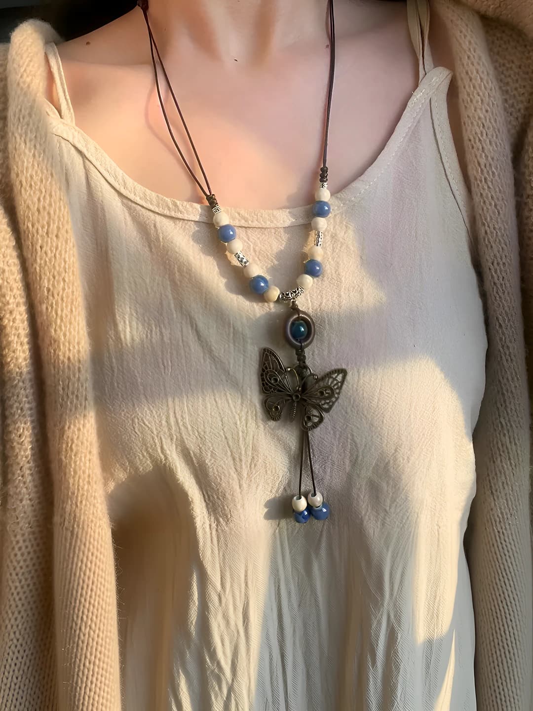 Long blue butterfly necklace