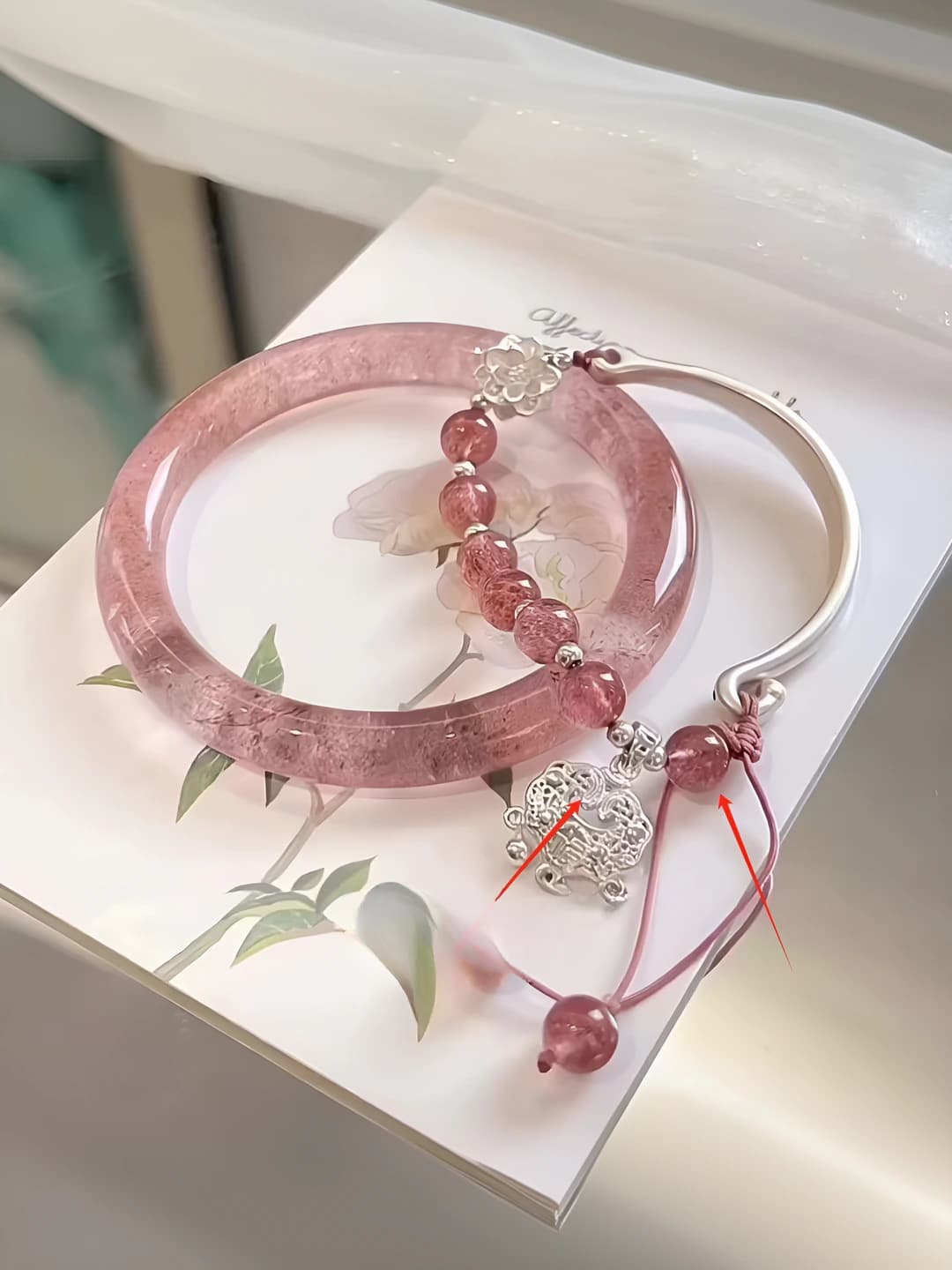 Strawberry smoothie bracelet [see arrow]