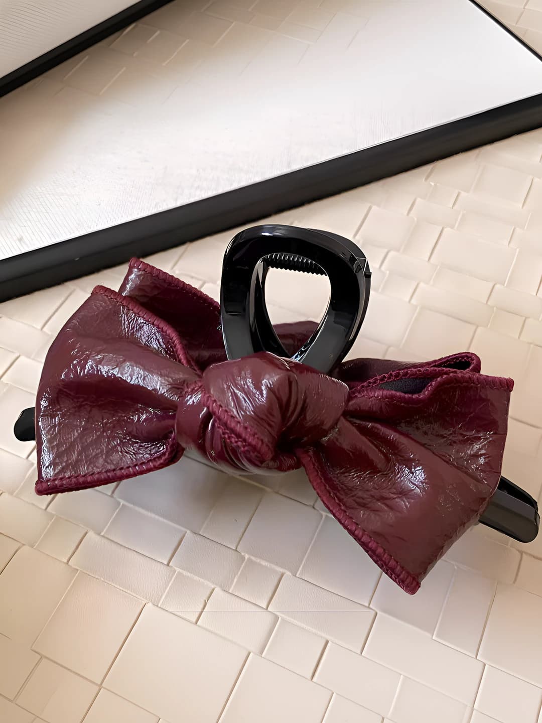 Red leather bow