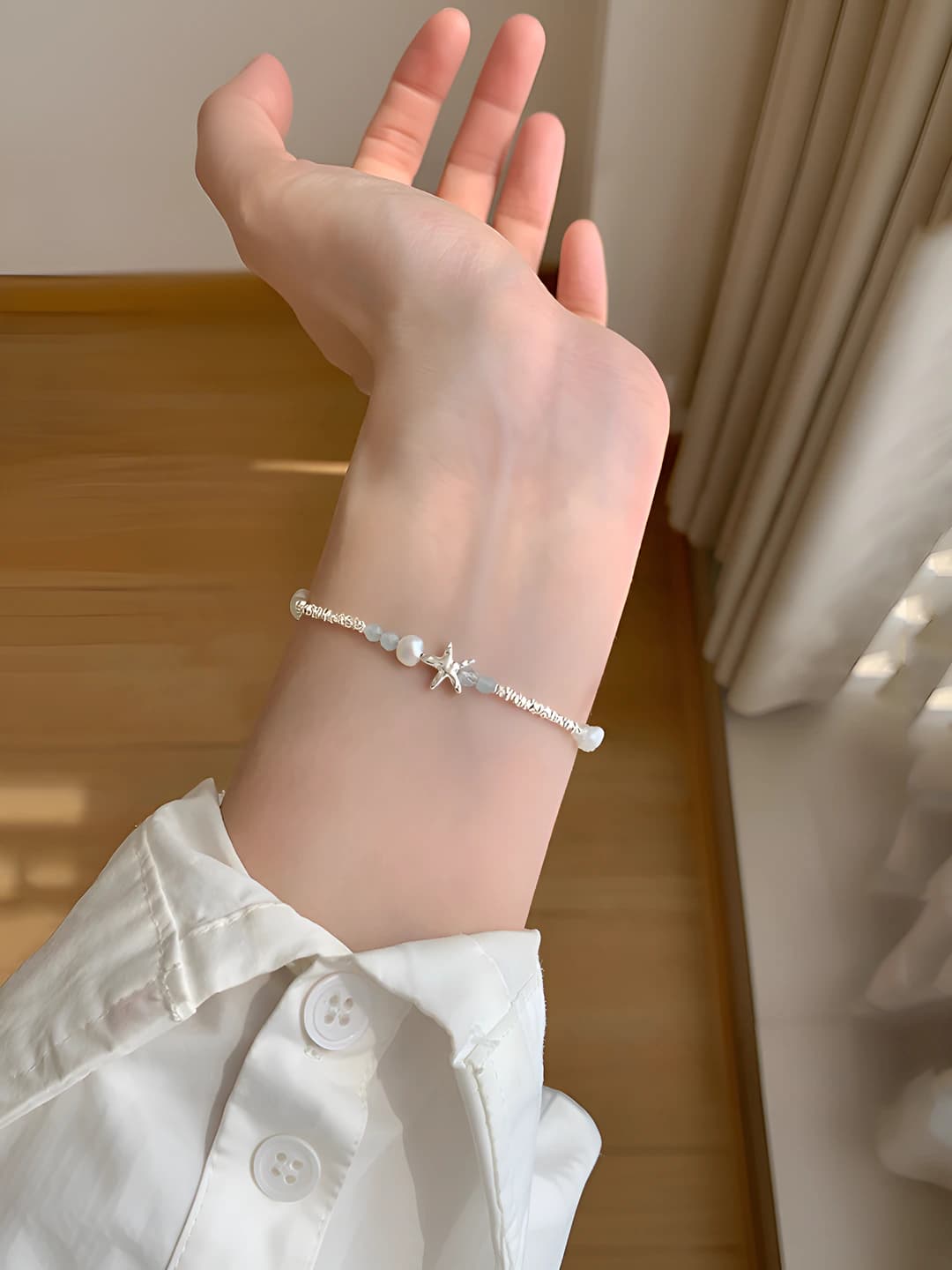 Starfish pearl silver bracelet