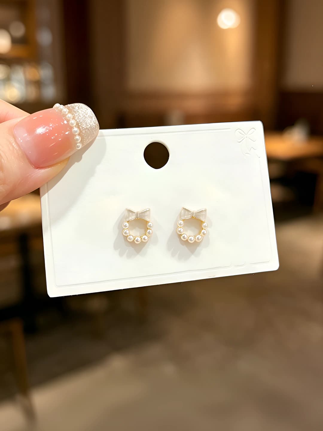 925 silver bow pearl rim stud
