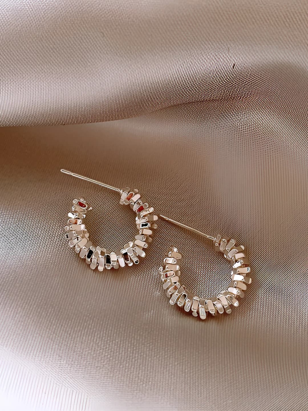 Silver textured stud earrings