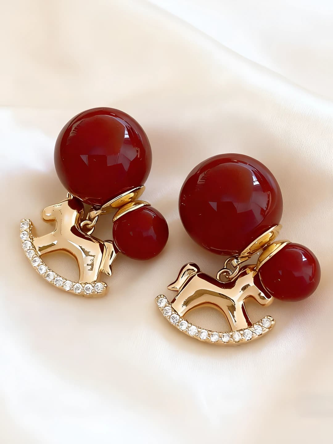 Red pearl ball gold pony drop earrings