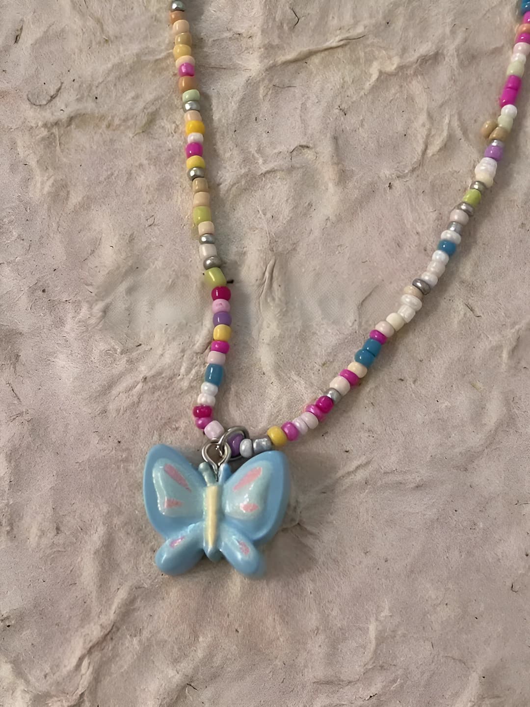 Blue butterfly necklace