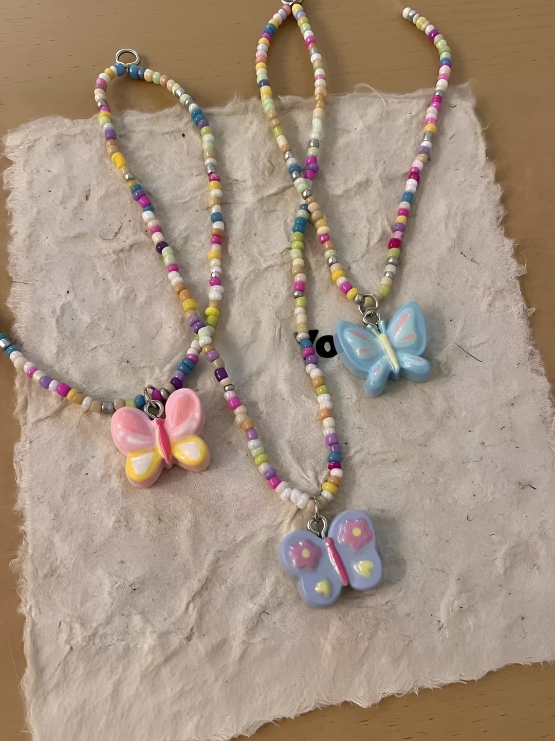 Women's handmade butterfly and star chain necklace