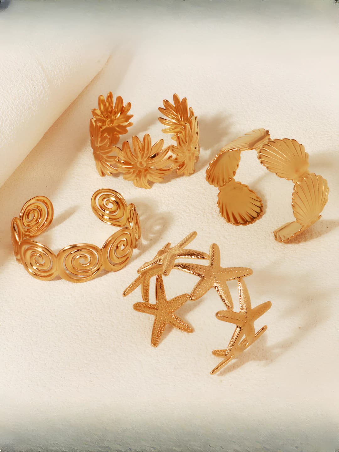 Women's open bangle bracelet: steel, shells, stars and ocean style with natural design element