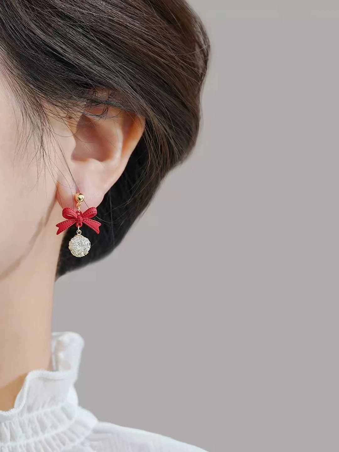 Bow zircon earrings