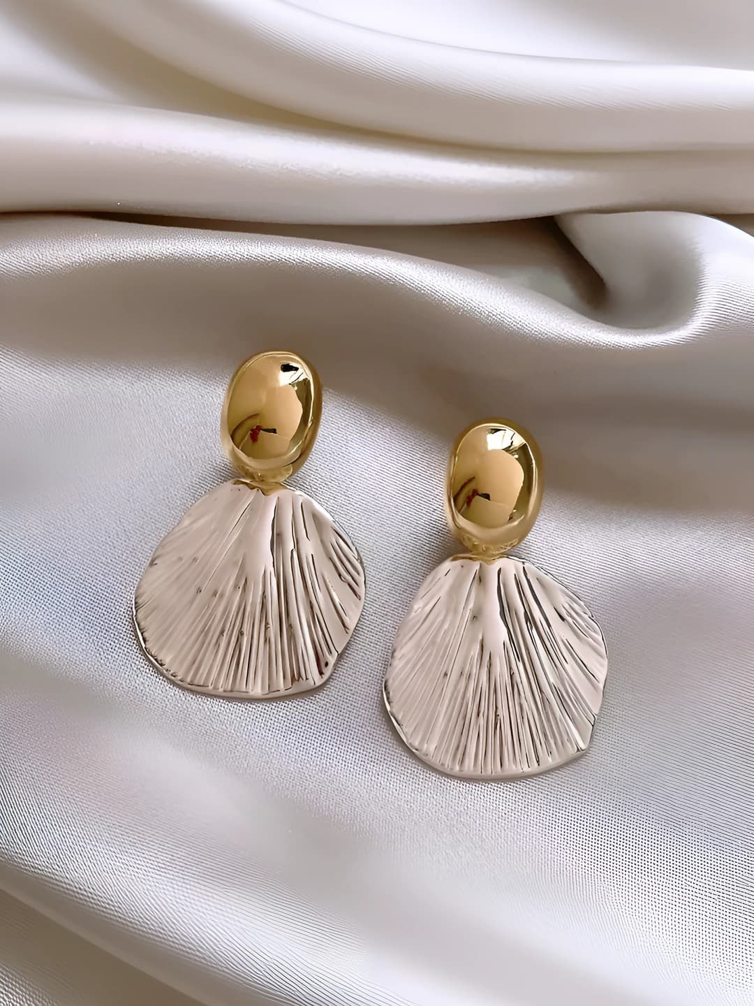Irregular silver leaf clip-on earrings