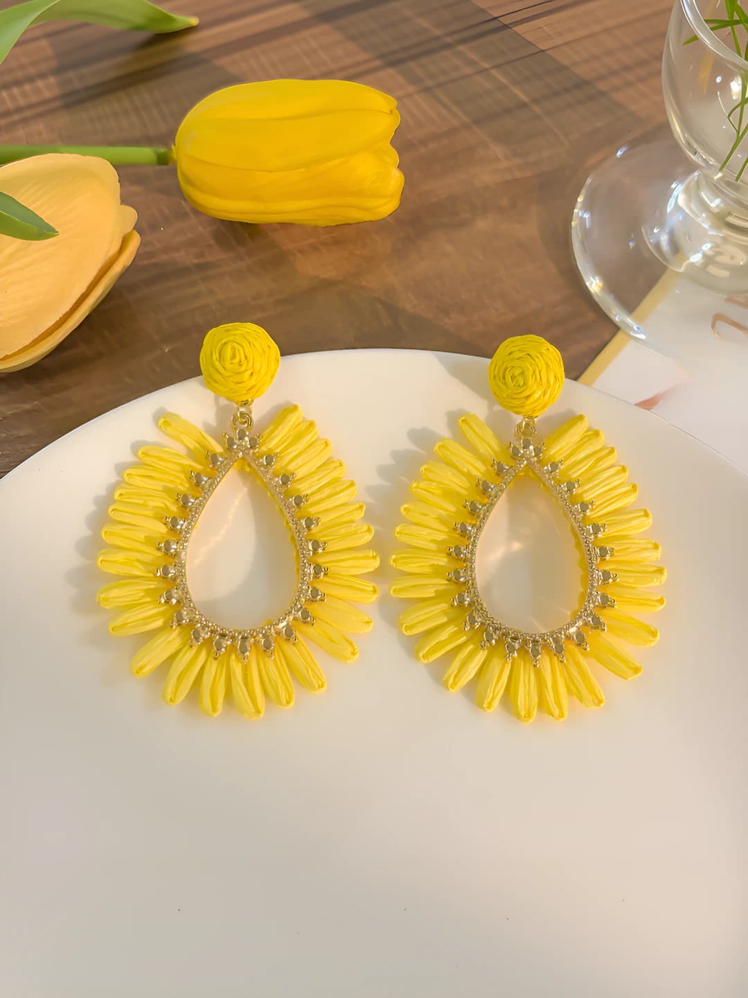 Yellow openwork woven stud earrings
