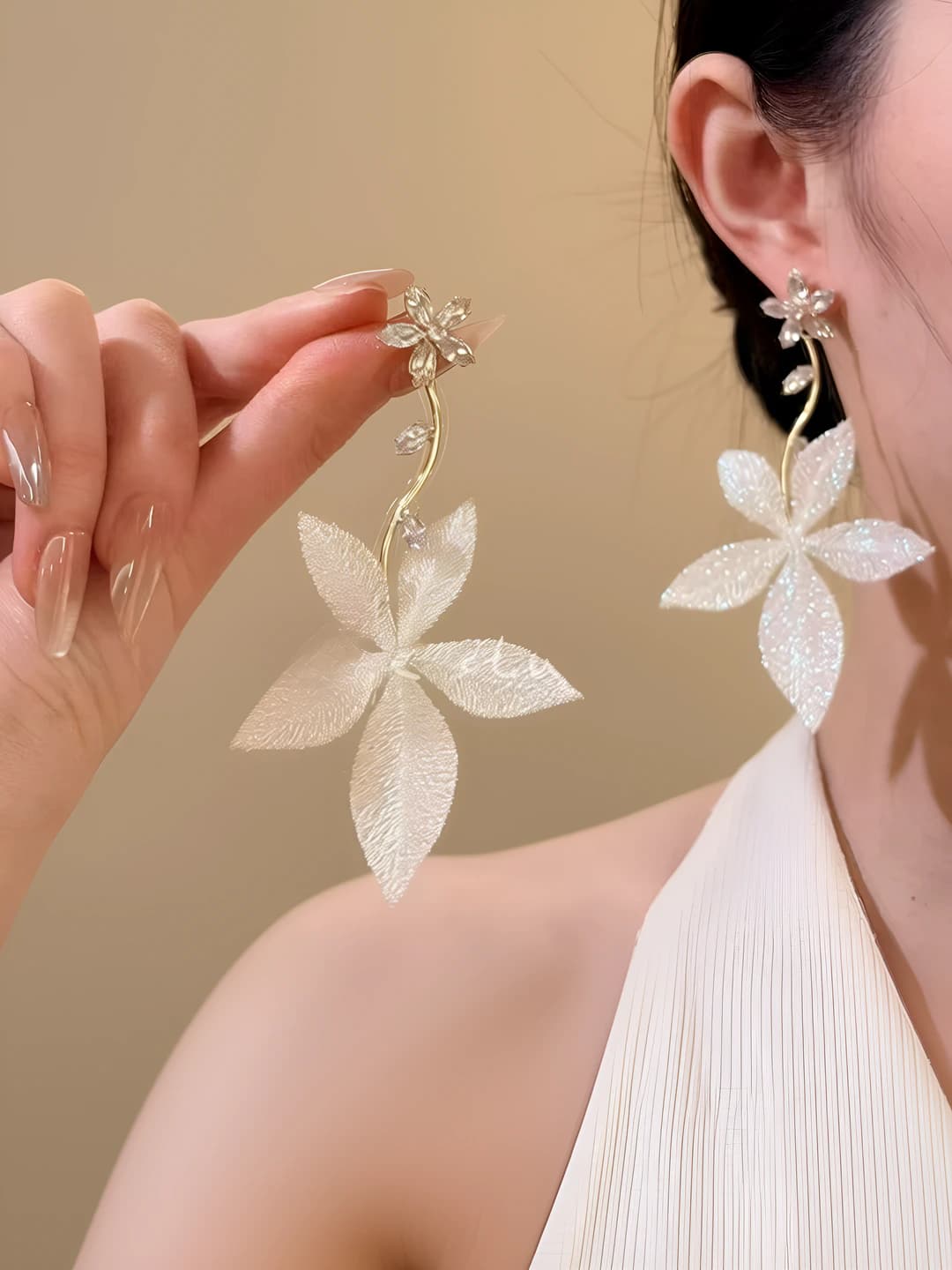 White woven flower zircon earrings