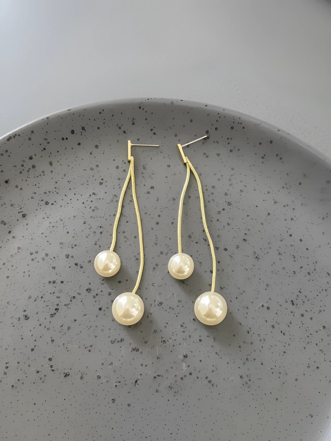 Gold pearl tassel earrings