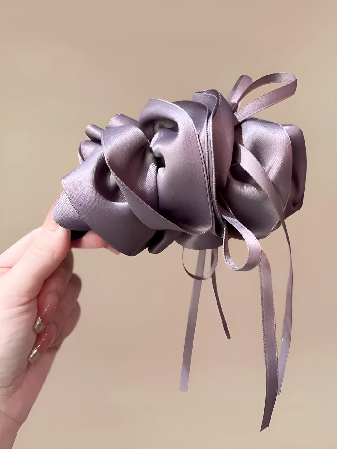 Purple ribbon bow