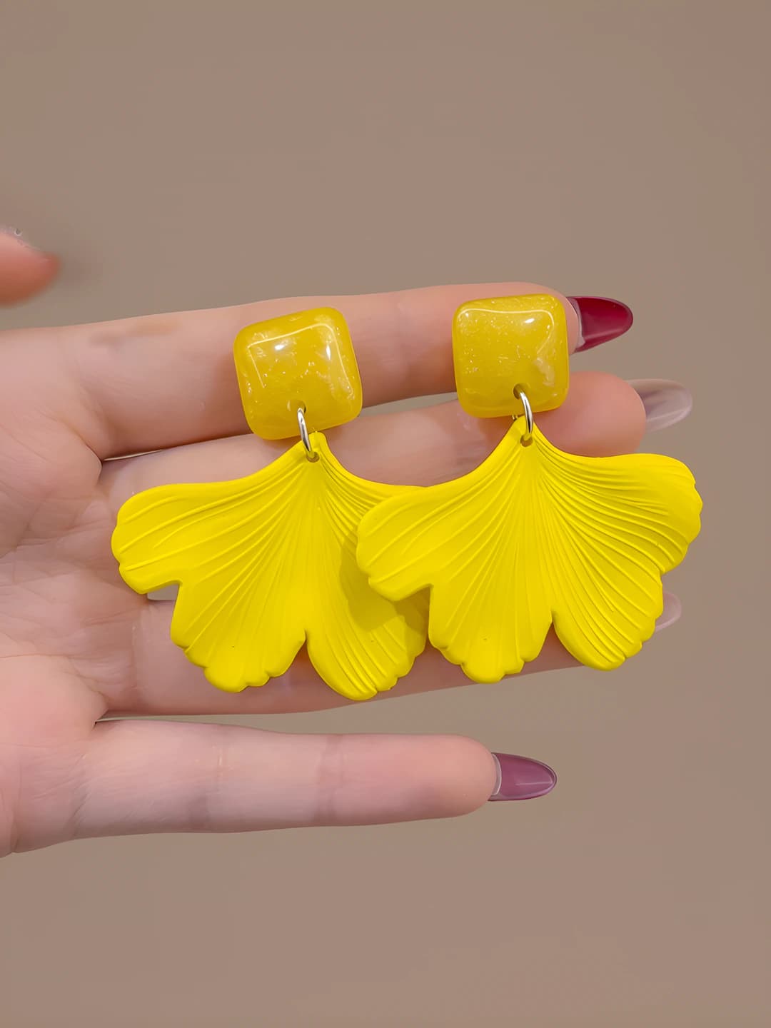 Yellow maple leaf clip-on earrings