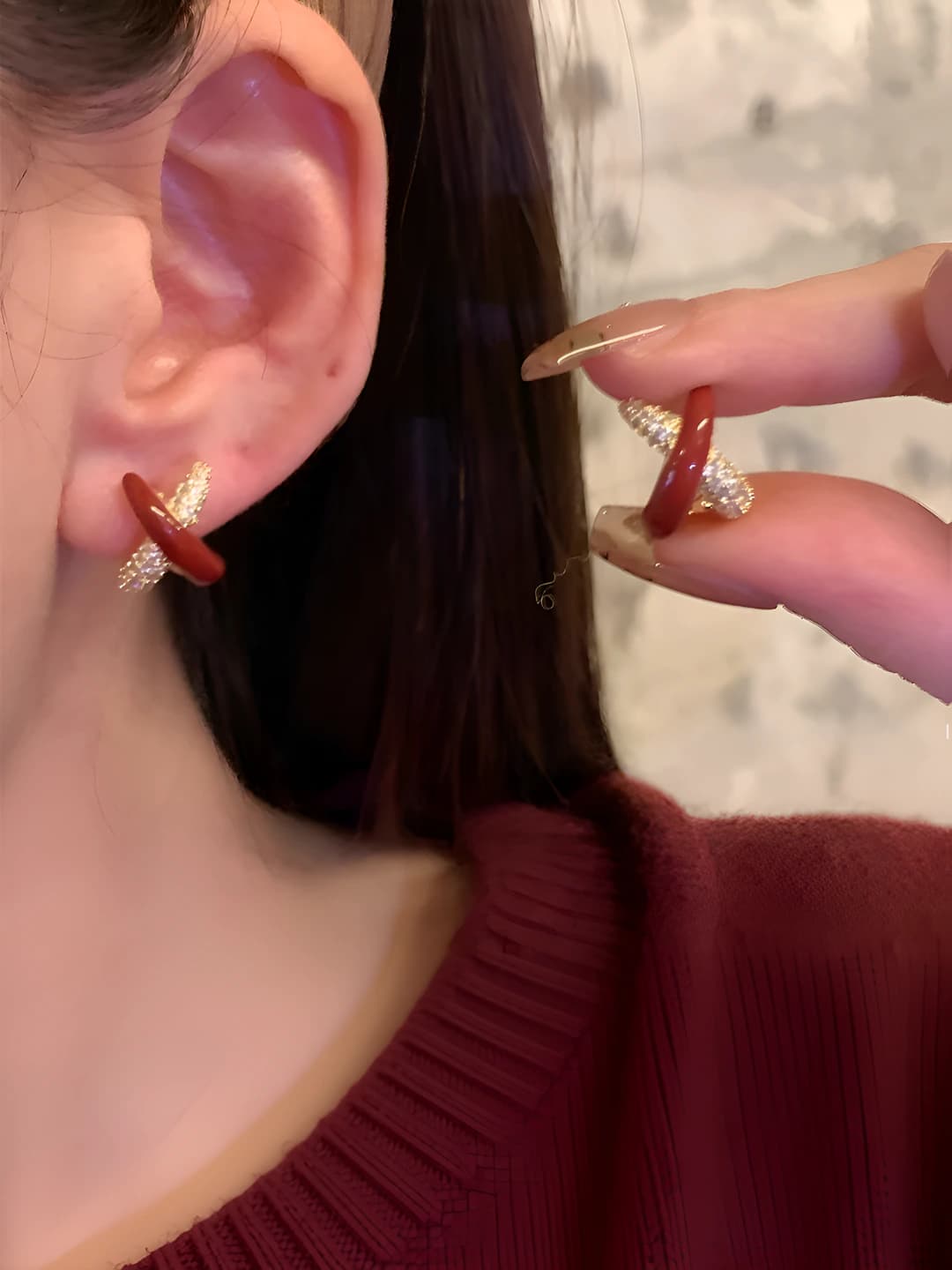 Red enameled hoop earrings