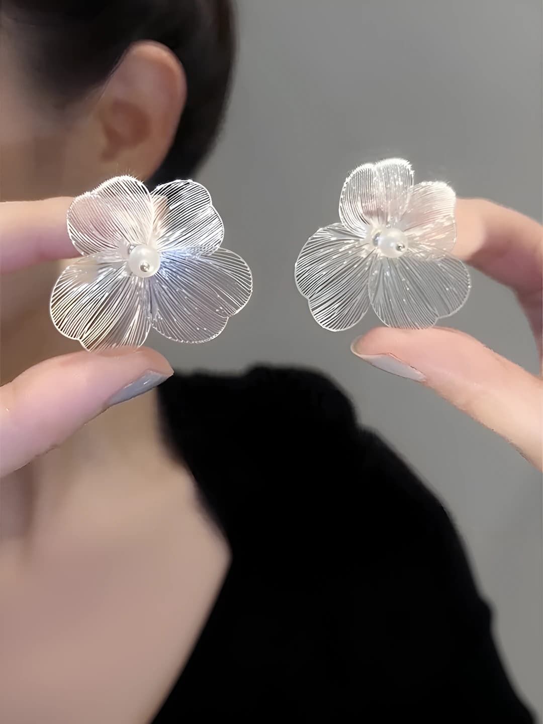 Women's silver large flower cut-out earrings