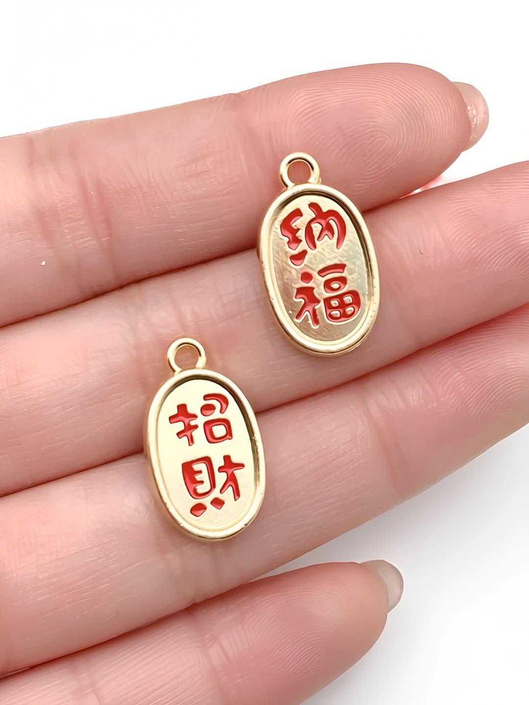 1 ta KC oltin Boylik (ikkita tomon) 19x11mm-1.4g-21698
