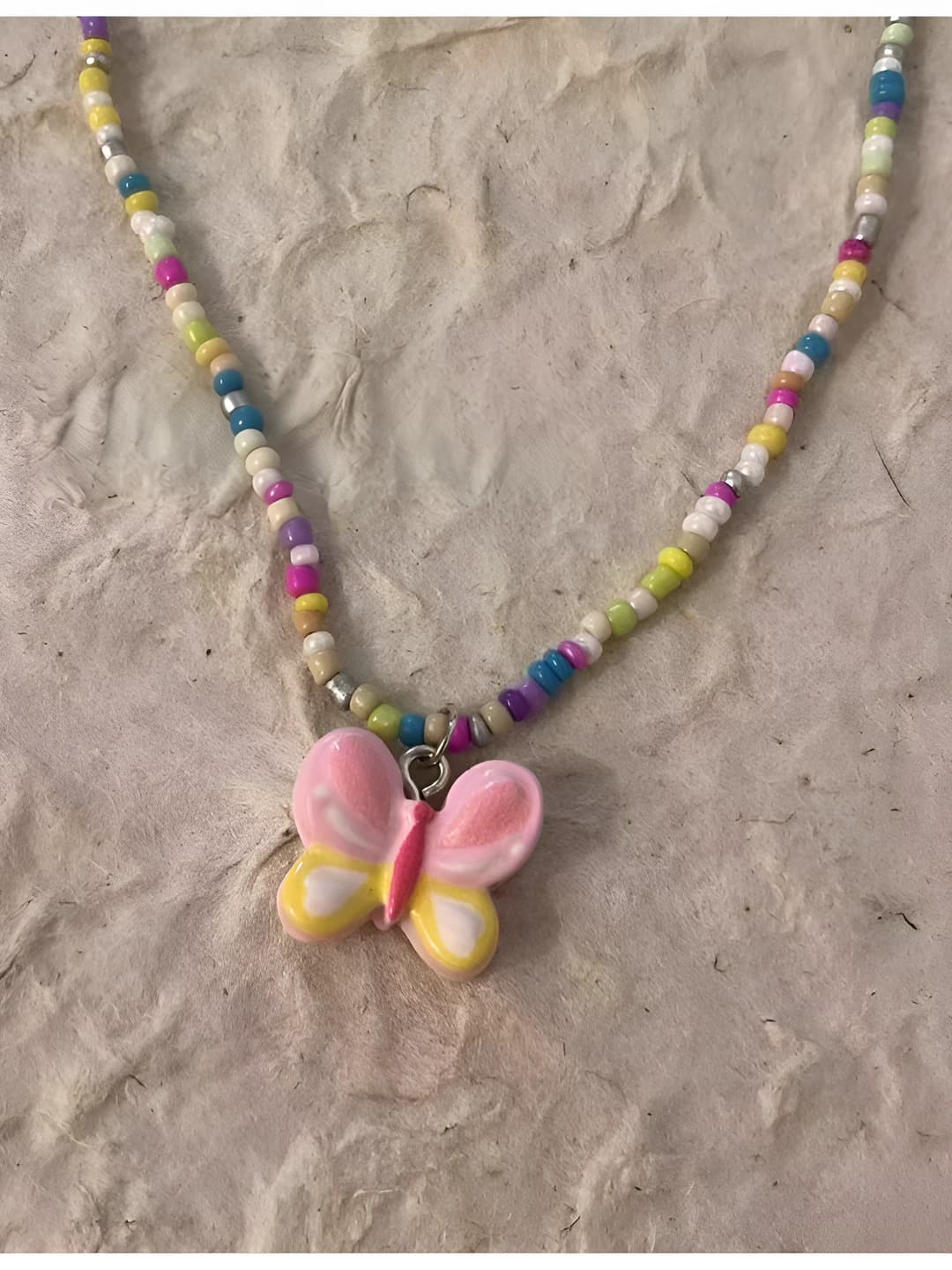 Pink butterfly necklace