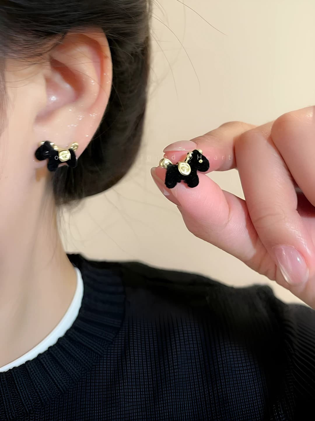 Black velvet pony stud earrings