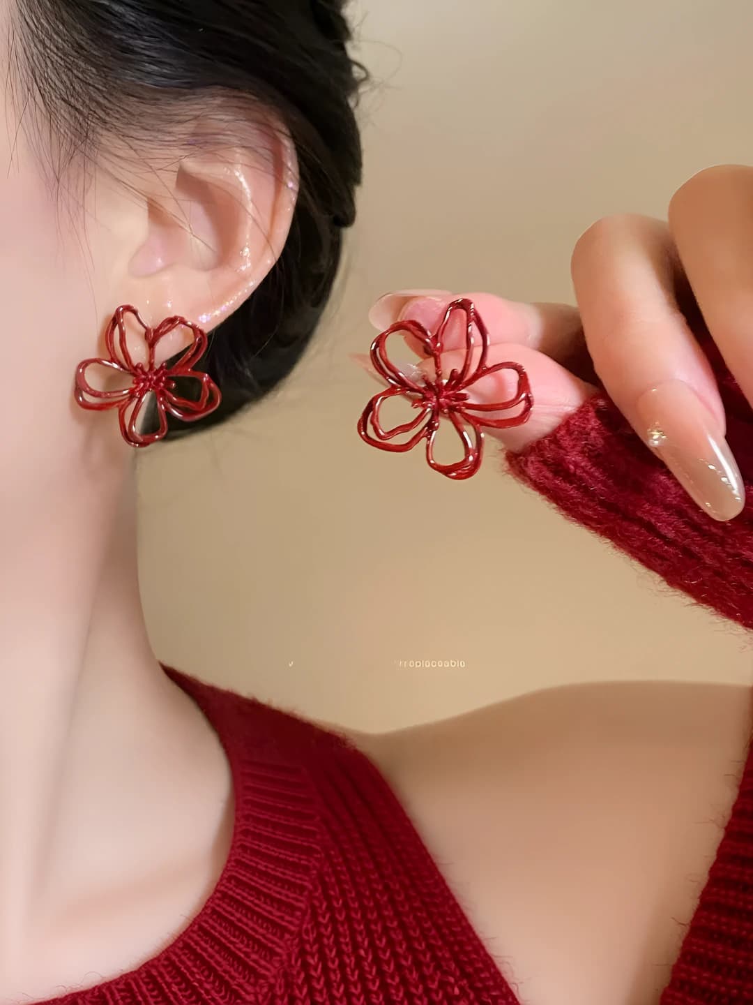 Red openwork flower earrings