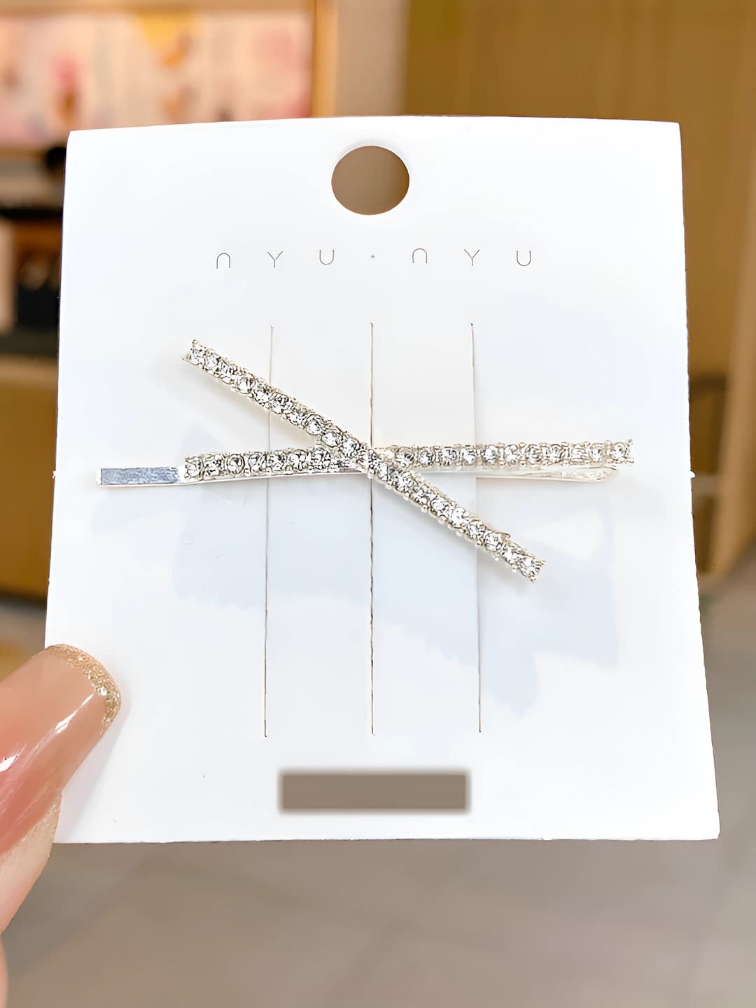 91# Silver crossed diamonds