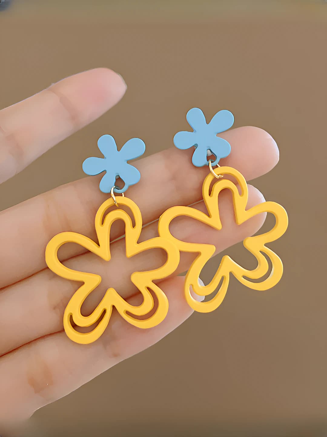 Blue yellow openwork flower studs