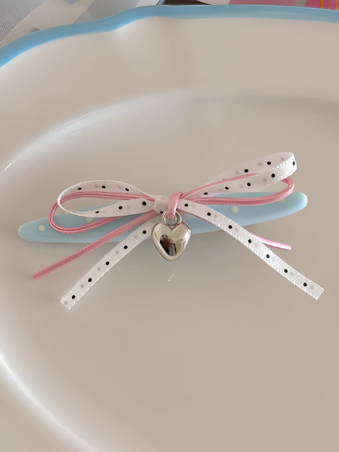 Polka dot bow clip