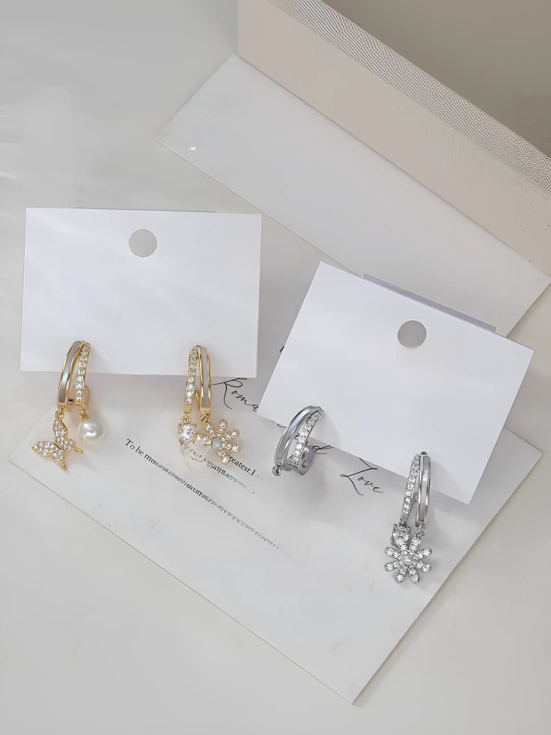 Women's autumn-winter French style pearl earrings with silver posts, shell and butterfly design