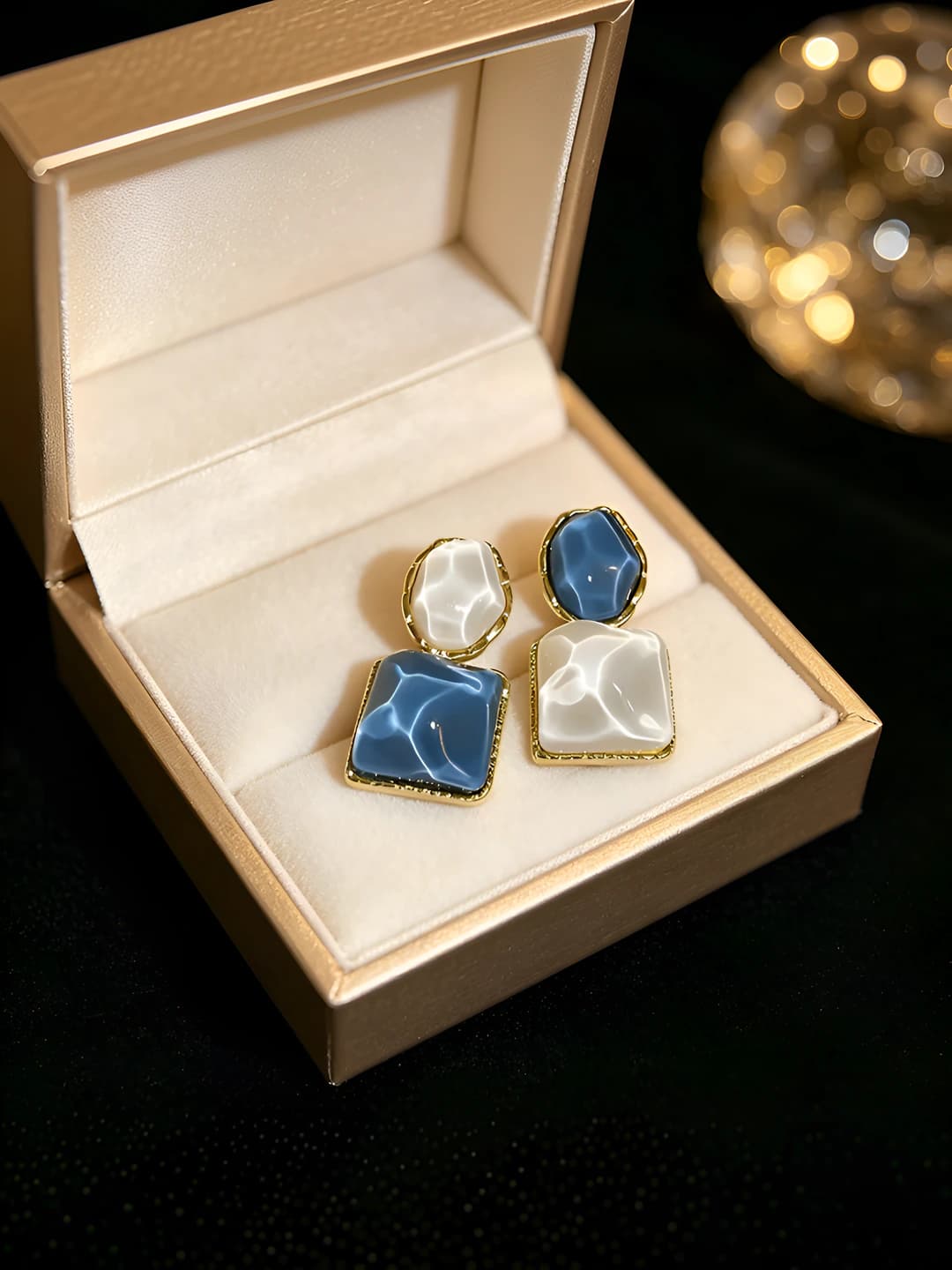 10# Asymmetric blue studs