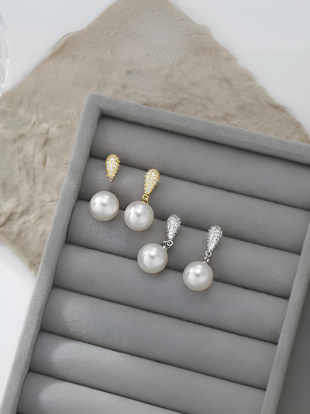 Women's retro French style pearl drop earrings with geometric shape and irregular design element, featuring silver posts and copper base