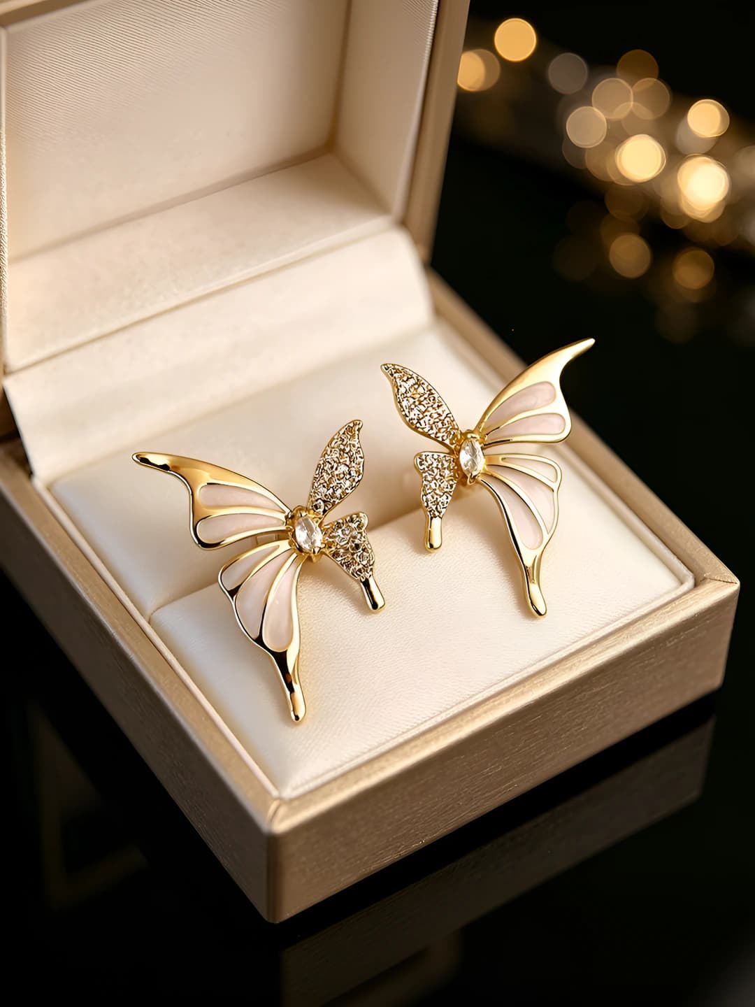 Zircon butterfly stud