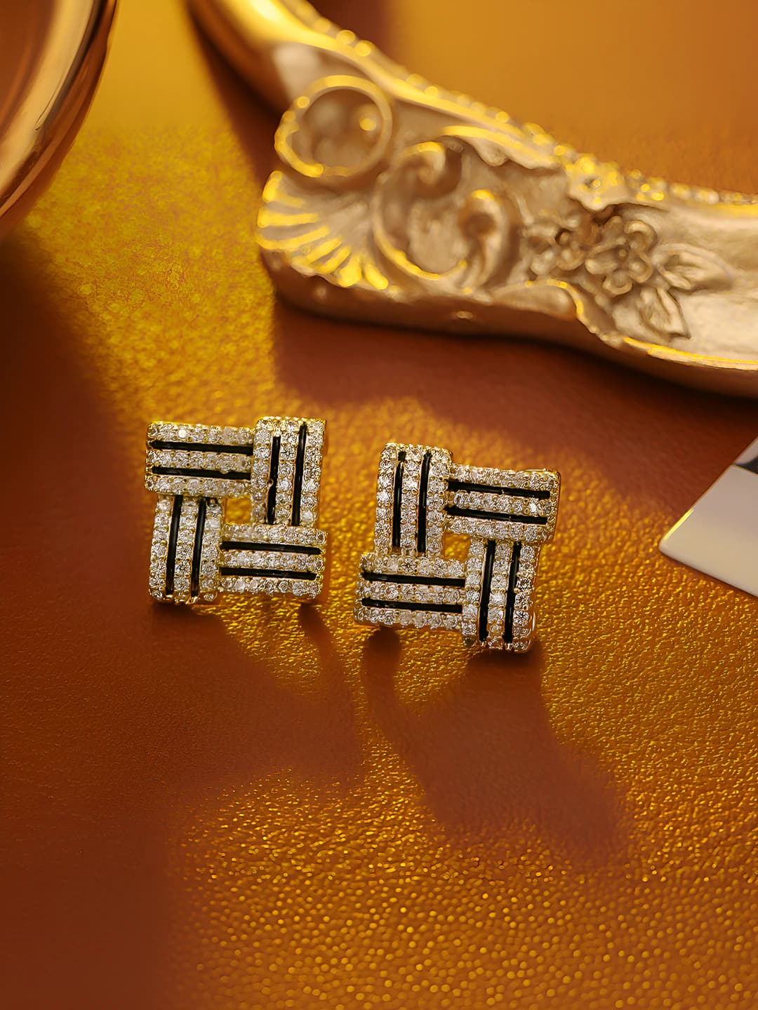 Gold zircon stud earrings