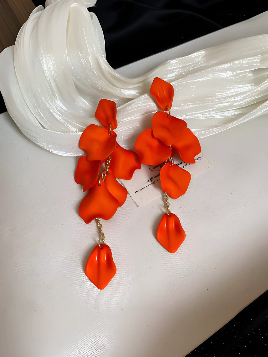 191# Silver - Orange tassel