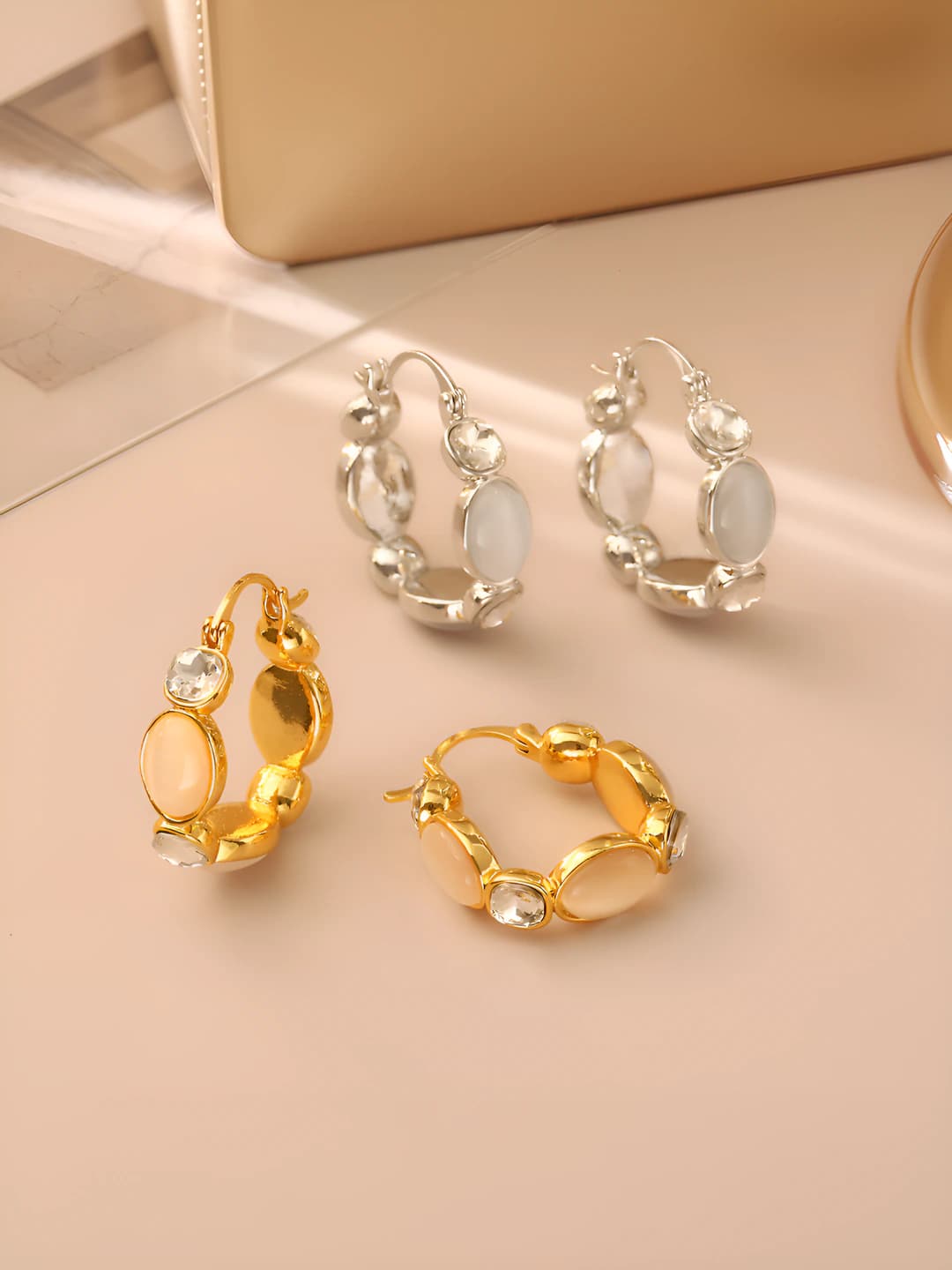 Women's hoop earrings made of copper with 18K gold plating, geometric shape