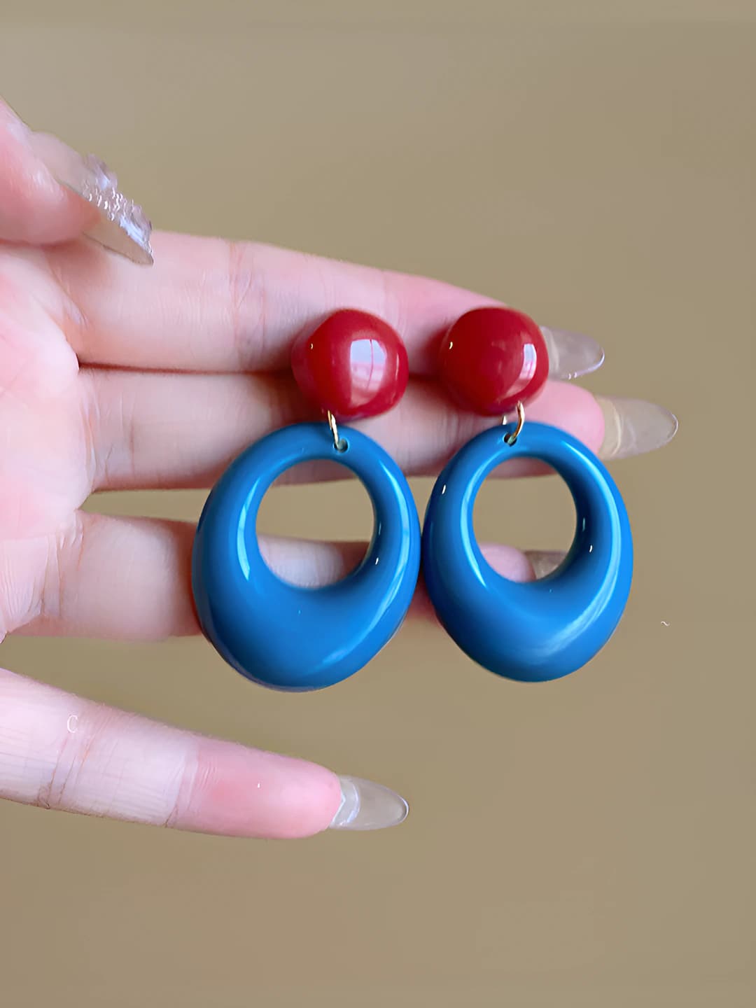 Blue circle pendant red beads earrings
