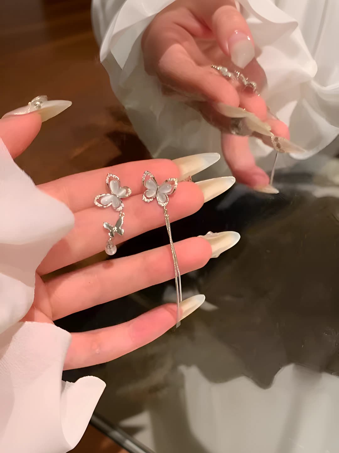 Women's summer asymmetric tassel cat-eye earrings with pearl and mother-of-pearl, Korean style, light luxury