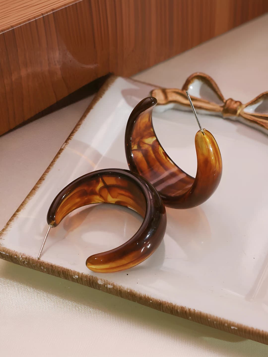 Tortoiseshell C-shaped studs