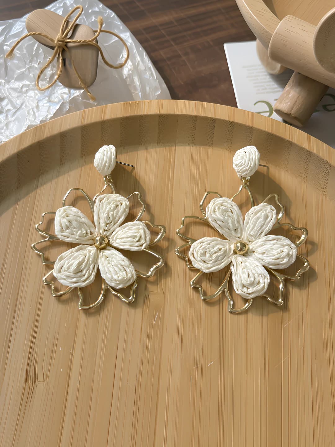 White straw sunflower studs