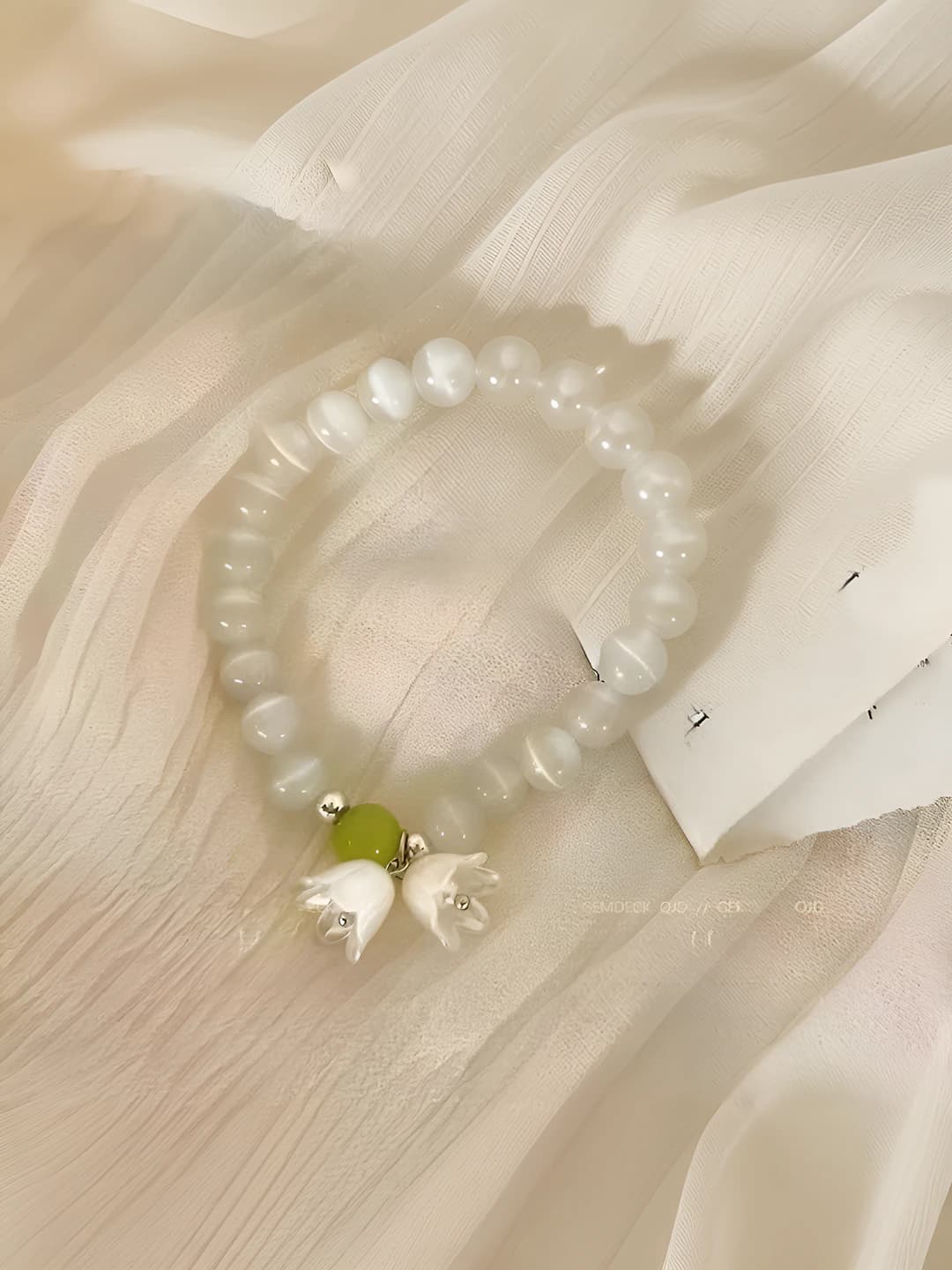 White jade bell bracelet