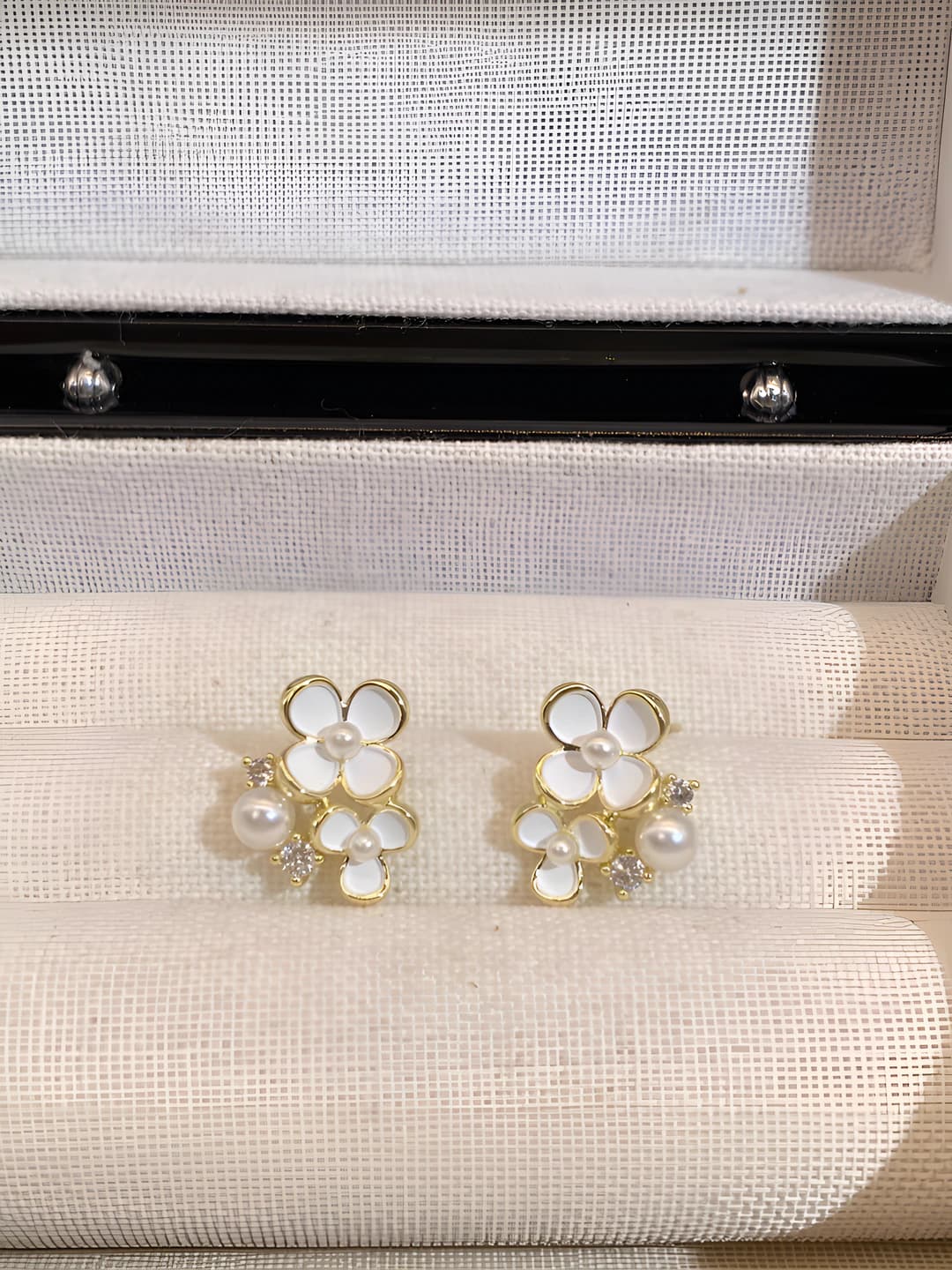 Two small flower earrings